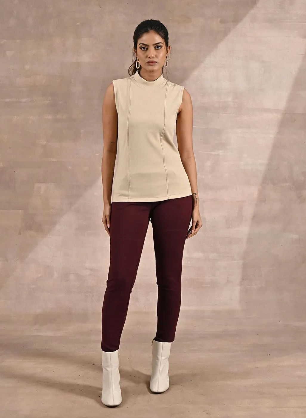 Beige Sleeveless Winter Top with Fine Stitch Detailing