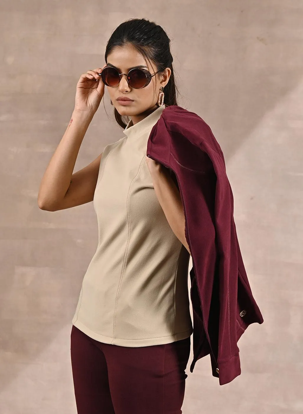 Beige Sleeveless Winter Top with Fine Stitch Detailing