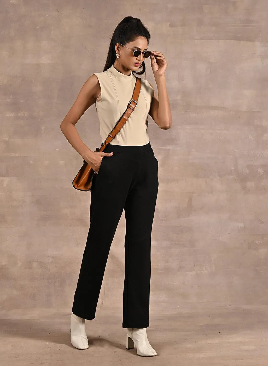 Beige Sleeveless Winter Top with Fine Stitch Detailing