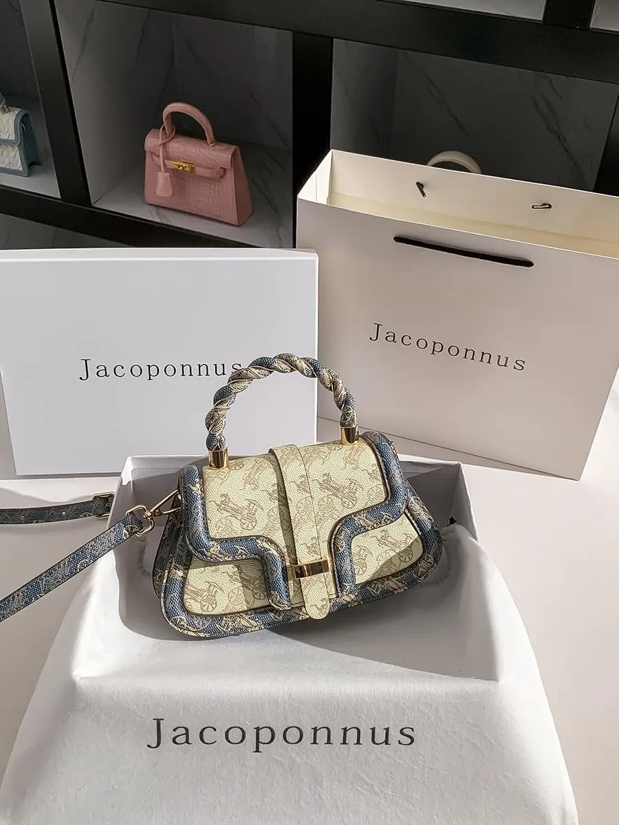 Genuine leather commuter saddle bag female 2024 new bag senior sense of light luxury niche handheld shoulder crossbody