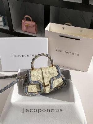 Genuine leather commuter saddle bag female 2024 new bag senior sense of light luxury niche handheld shoulder crossbody